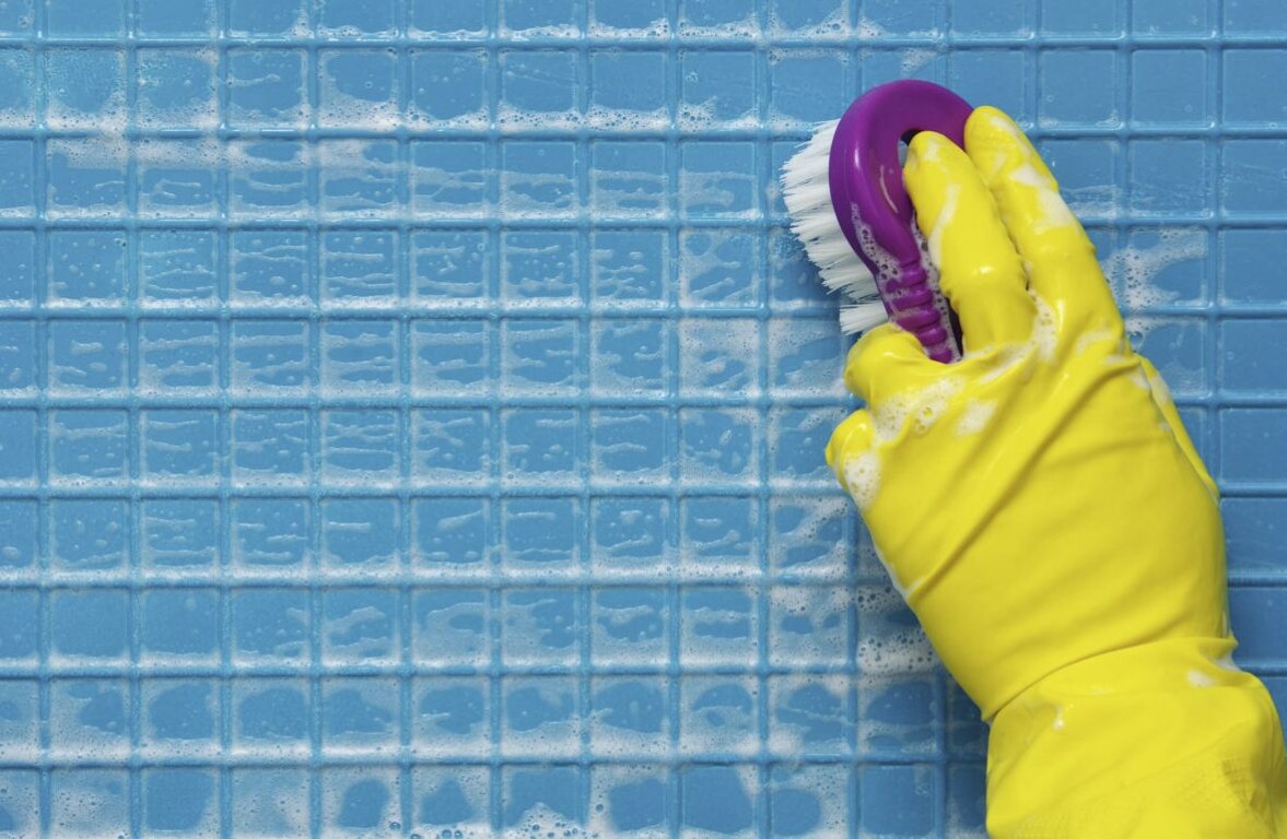 Professional pool tile cleaning removing calcium scale buildup